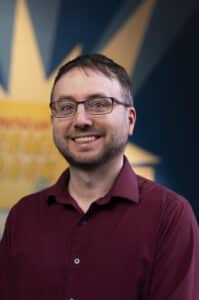 Shane Rhinewald photo, maroon shirt 