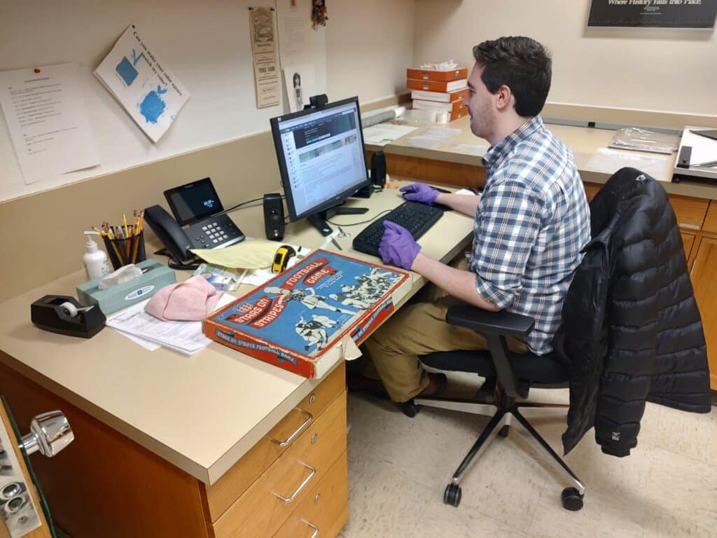 Cataloging and accessioning board games. 