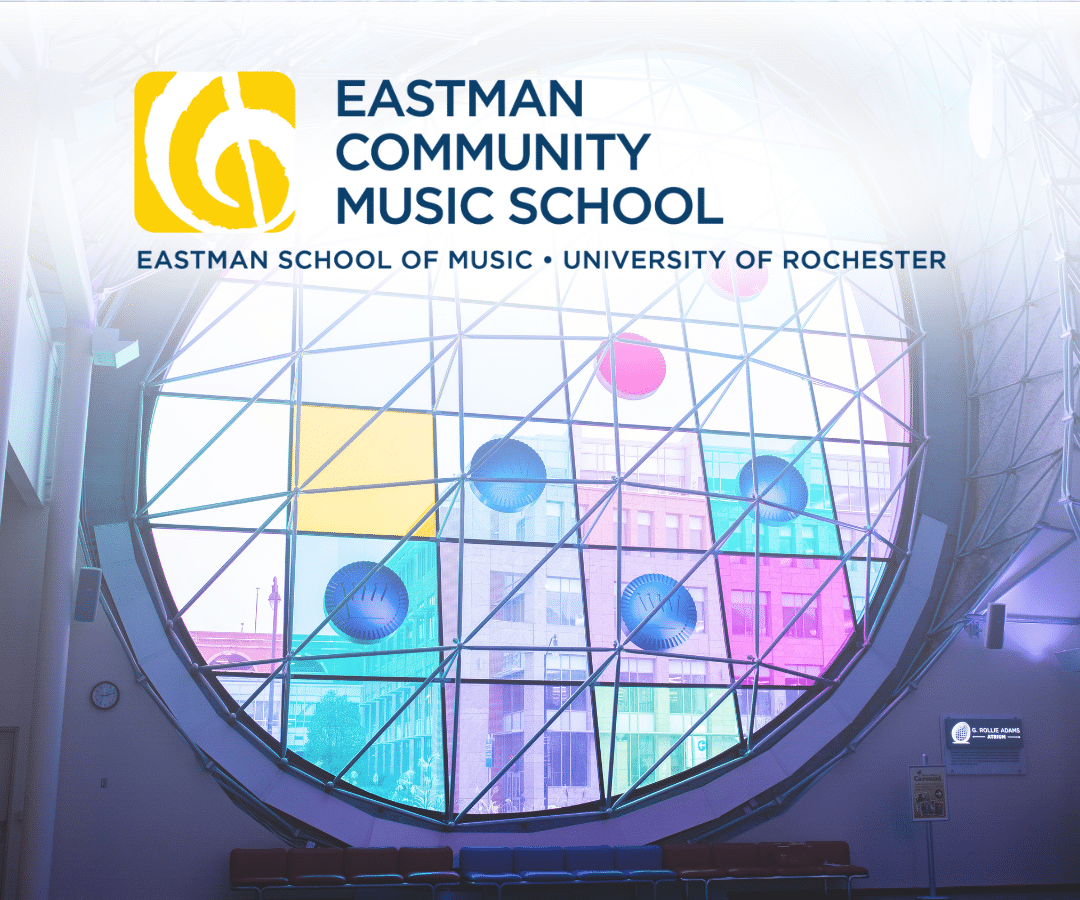 The window in Adams Atrium with the Eastman Community Music School Logo